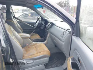 2005 Honda Pilot EX-L with VIN 2HKYF185X5H573585, listed as a IAAI auction lot 42094532 with 1 mi miles. Bid and sale history available at carsss.com. Image 5.