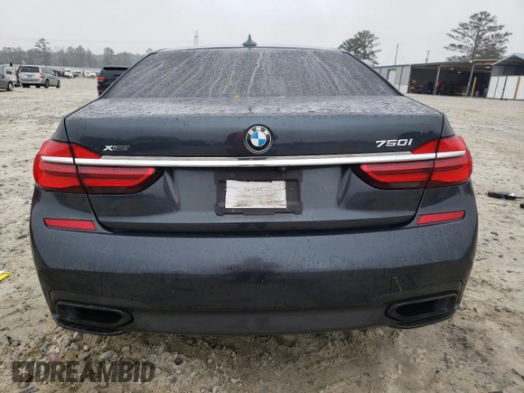 2016 BMW 7 Series 750i xDrive with VIN WBA7F2C54GG415272, listed as a Copart auction lot 86573664 with Not provided miles and Salvage title. Bid and sale history available at DreamBid. Image 6.