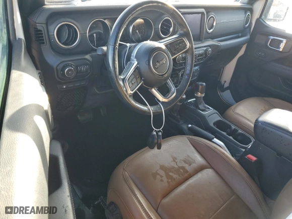 2021 Jeep Wrangler 4xe Unlimited Sahara with VIN 1C4JJXP62MW677073, listed as a Copart auction lot 77494174 with 0 mi miles and Salvage Title. Bid and sale history available at carsss.com. Image 8.