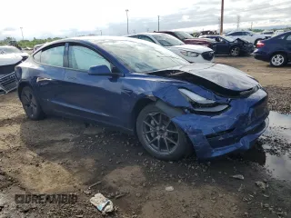 2023 Tesla Model 3 z VIN 5YJ3E1EA3PF627177, wystawiony jako Copart lot #61555235 z przebiegiem 22 340 mil mil oraz Czysty tytuł • Clean title. Historia ofert i sprzedaży dostępna na DreamBid. Obrazek 4.