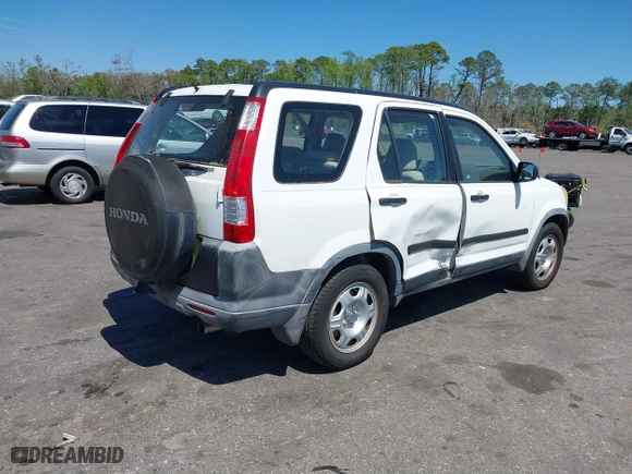 2006 Honda CR-V LX with VIN JHLRD68546C026819, listed as a IAAI auction lot 41883259 with 136,150 mi miles. Bid and sale history available at carsss.com. Image 4.