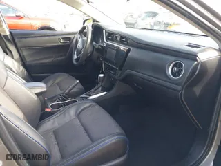 2019 Toyota Corolla L with VIN 5YFBURHEXKP922883, listed as a IAAI auction lot 41702924 with 99,166 mi miles. Bid and sale history available at carsss.com. Image 5.
