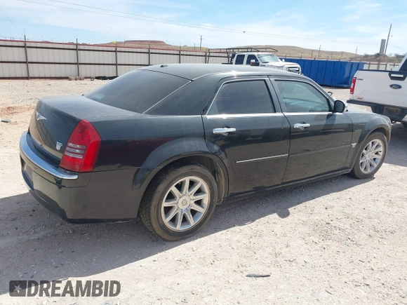 2006 Chrysler 300 C with VIN 2C3KA63H56H316500, listed as a IAAI auction lot 41811247 with 135,100 mi miles. Bid and sale history available at carsss.com. Image 4.