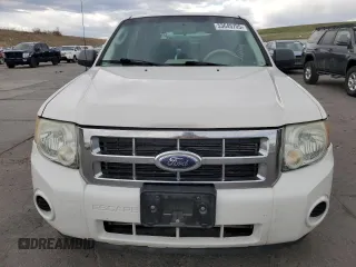 2009 Ford Escape XLS with VIN 1FMCU92749KB31140, listed as a Copart auction lot 53645705 with 213,481 mi miles and Salvage title. Bid and sale history available at DreamBid. Image 5.