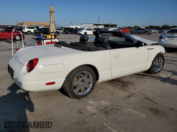 2002 Ford Thunderbird Hardtop Premium z VIN 1FAHP60A52Y115214, wystawiony jako Copart lot #70801894 z przebiegiem Nie podano mil oraz Szkoda całkowita • Salvage title. Historia ofert i sprzedaży dostępna na DreamBid. Obrazek 3.