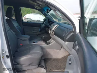 2011 Toyota Tacoma with VIN 3TMLU4EN3BM077216, listed as a IAAI auction lot 41916370 with 159,554 mi miles. Bid and sale history available at carsss.com. Image 5.