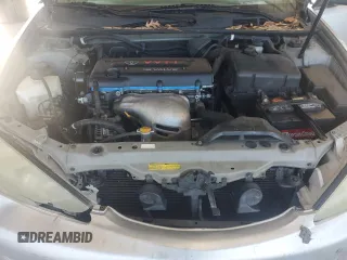 2005 Toyota Camry STD z VIN 4T1BE32K35U598719, wystawiony jako Copart lot #84796804 z przebiegiem 148 683 mil mil oraz Szkoda całkowita • Salvage title. Historia ofert i sprzedaży dostępna na DreamBid. Obrazek 11.