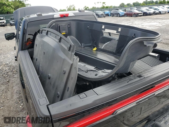 2022 Ford F-150 Lightning Pro with VIN 1FTVW1EL7NWG00726, listed as a Copart auction lot 57283755 with 55,672 mi miles and Salvage title. Bid and sale history available at DreamBid. Image 12.