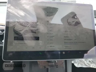 2023 Tesla Model Y Long Range z VIN 7SAYGDEE9PA070232, wystawiony jako Copart lot #55881805 z przebiegiem 38 276 mil mil oraz Szkoda całkowita • Salvage title. Historia ofert i sprzedaży dostępna na DreamBid. Obrazek 9.