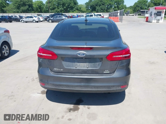 2018 Ford Focus SE with VIN 1FADP3FE3JL204220, listed as a IAAI auction lot 41972960 with 62,682 mi miles and . Bid and sale history available at DreamBid. Image 16.