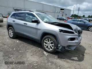 2017 Jeep Cherokee Sport with VIN 1C4PJMAB4HW646802, listed as a Copart auction lot 56667035 with 135,049 mi miles and Salvage title. Bid and sale history available at DreamBid. Image 4.