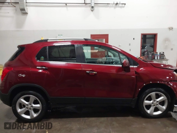 2016 Chevrolet Trax LTZ with VIN 3GNCJRSB9GL166289, listed as a IAAI auction lot 41674434 with 157,109 mi miles. Bid and sale history available at carsss.com. Image 13.