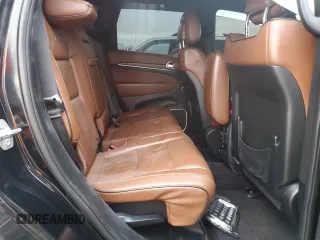 2018 Jeep Grand Cherokee Summit with VIN 1C4RJFJT2JC390079, listed as a Copart auction lot 43502555 with 106,724 mi miles and Salvage title. Bid and sale history available at DreamBid. Image 11.