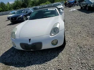 2008 Pontiac Solstice z VIN 1G2MC35B58Y123587, wystawiony jako Copart lot #52017005 z przebiegiem Nie podano mil oraz Szkoda całkowita • Salvage title. Historia ofert i sprzedaży dostępna na DreamBid. Obrazek 11.