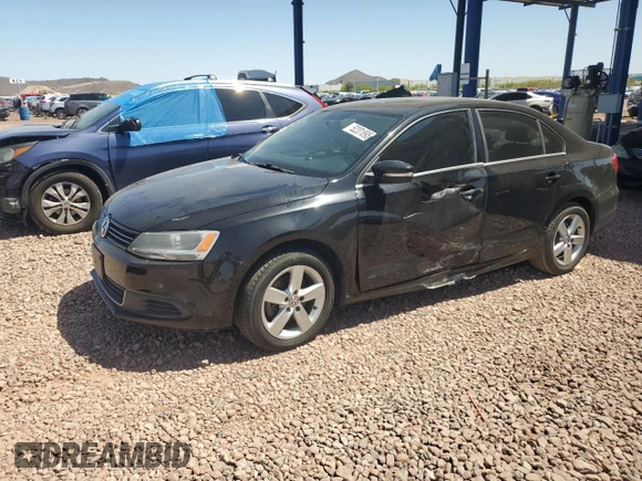 2014 Volkswagen Jetta TDI w/Premium with VIN 3VWLL7AJ8EM402757, listed as a Copart auction lot 52201895 with 99,475 mi miles and Salvage title. Bid and sale history available at DreamBid. Image 1.