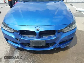 2015 BMW 3 Series 328i xDrive with VIN WBA3B3C57FJ985025, listed as a IAAI auction lot 42140398 with 134,643 mi miles and . Bid and sale history available at DreamBid. Image 6.