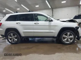 2013 Jeep Grand Cherokee Overland with VIN 1C4RJFCT1DC586886, listed as a IAAI auction lot 41941590 with 125,126 mi miles. Bid and sale history available at carsss.com. Image 13.