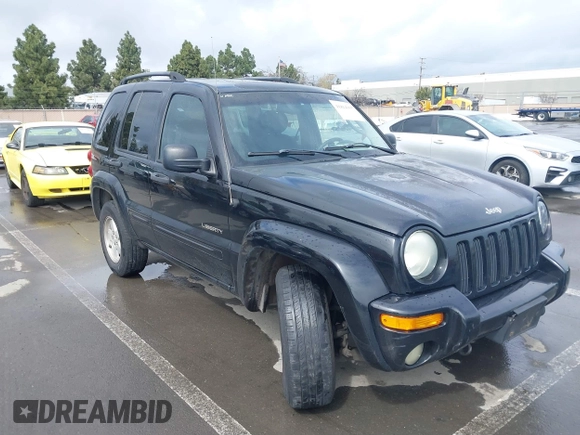 2004 Jeep Liberty Limited with VIN 1J4GL58K14W184032, listed as a IAAI auction lot 41814355 with 276,413 mi miles. Bid and sale history available at carsss.com. Image 6.