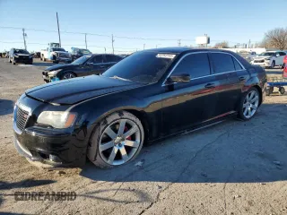 2012 Chrysler 300 SRT8 with VIN 2C3CCAFJ0CH800893, listed as a Copart auction lot 88352515 with 143,381 mi miles and Salvage Title. Bid and sale history available at carsss.com. Image 1.