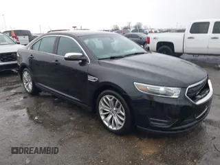 2015 Ford Taurus Limited with VIN 1FAHP2F87FG146554, listed as a IAAI auction lot 41712502 with 103,117 mi miles. Bid and sale history available at carsss.com. Image 1.