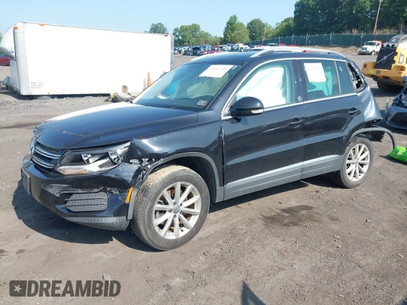 2017 Volkswagen Tiguan Wolfsburg Edition with VIN WVGSV7AX8HK028638, listed as a IAAI auction lot 42562548 with 80,315 mi miles and . Bid and sale history available at DreamBid. Image 2.