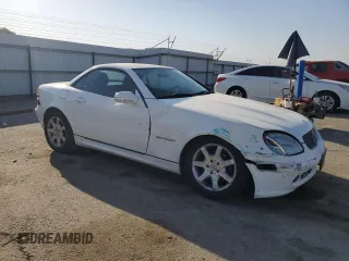 2002 Mercedes-Benz SLK-Class 2.3L Kompressor with VIN WDBKK49F62F257017, listed as a Copart auction lot 73859374 with 125,733 mi miles and Salvage Title. Bid and sale history available at carsss.com. Image 4.