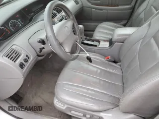 2001 Toyota Avalon XL z VIN 4T1BF28B01U138751, wystawiony jako Copart lot #44849165 z przebiegiem 225 082 mil mil oraz Tytuł czysty. Historia ofert i sprzedaży dostępna na DreamBid. Obrazek 7.