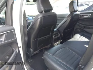 2020 Ford Edge SEL z VIN 2FMPK4J9XLBA07663, wystawiony jako IAAI lot #42115904 z przebiegiem 45 385 mil mil oraz . Historia ofert i sprzedaży dostępna na DreamBid. Obrazek 8.