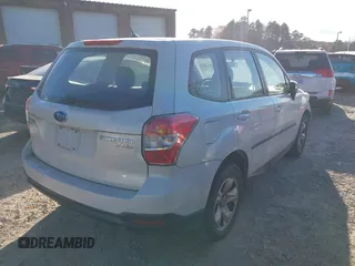 2014 Subaru Forester 2.5i with VIN JF2SJAAC4EG414600, listed as a IAAI auction lot 41006289 with 128,611 mi miles. Bid and sale history available at carsss.com. Image 4.