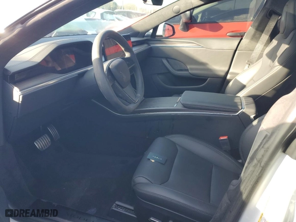 2024 Tesla Model S with VIN 5YJSA1E59RF541014, listed as a Copart auction lot 86646114 with 7,404 mi miles and Salvage Title. Bid and sale history available at carsss.com. Image 7.