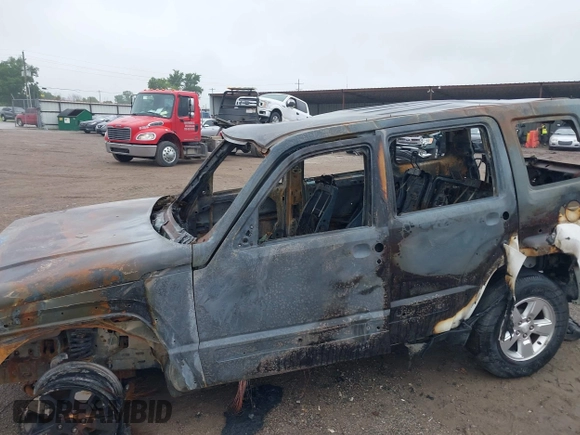 2011 Jeep Liberty Sport Jet with VIN 1J4PN2GK9BW593774, listed as a IAAI auction lot 42336901 with Not provided miles and . Bid and sale history available at DreamBid. Image 6.