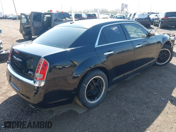 2014 Chrysler 300 C with VIN 2C3CCAKG5EH179583, listed as a IAAI auction lot 42001109 with 148,288 mi miles and . Bid and sale history available at carsss.com. Image 4.