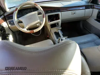 1994 Cadillac Seville Luxury SLS z VIN 1G6KS52Y8RU810729, wystawiony jako Copart lot #54942065 z przebiegiem 144 154 mil mil oraz Tytuł czysty. Historia ofert i sprzedaży dostępna na DreamBid. Obrazek 8.