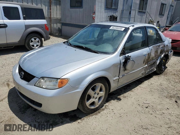 2002 Mazda Protege DX z VIN JM1BJ225920543960, wystawiony jako Copart lot #56336555 z przebiegiem 173 874 mil mil oraz Szkoda całkowita • Salvage title. Historia ofert i sprzedaży dostępna na DreamBid. Obrazek 1.