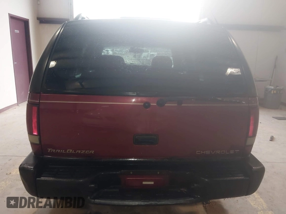 1999 Chevrolet Blazer Trailblazer z VIN 1GNDT13W4X2187490, wystawiony jako IAAI lot #41966073 z przebiegiem 187 604 mil mil oraz . Historia ofert i sprzedaży dostępna na DreamBid. Obrazek 17.