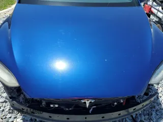 2016 Tesla Model X 70D z VIN 5YJXCAE29GF001522, wystawiony jako Copart lot #56571115 z przebiegiem 129 924 mil mil oraz Szkody całkowita. Historia ofert i sprzedaży dostępna na DreamBid. Obrazek 11.