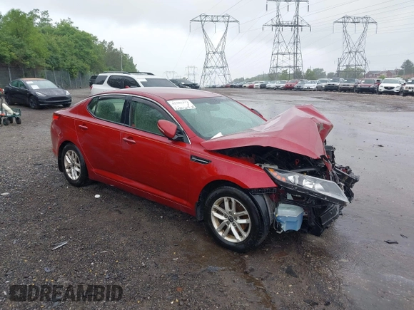 2011 Kia Optima LX z VIN KNAGM4A75B5168564, wystawiony jako IAAI lot #42301373 z przebiegiem Nie podano mil oraz . Historia ofert i sprzedaży dostępna na DreamBid. Obrazek 1.