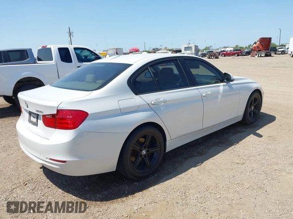 2014 BMW 3 Series 320i with VIN WBA3B1C53EP680072, listed as a IAAI auction lot 41996500 with 192,948 mi miles. Bid and sale history available at carsss.com. Image 4.