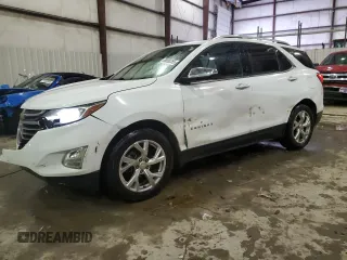 2020 Chevrolet Equinox Premier z VIN 2GNAXNEV2L6164550, wystawiony jako Copart lot #88095355 z przebiegiem 132 469 mil mil oraz Szkoda całkowita • Salvage title. Historia ofert i sprzedaży dostępna na DreamBid. Obrazek 1.