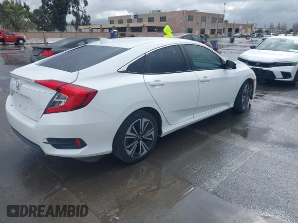 2017 Honda Civic EX-L z VIN 2HGFC1F79HH635156, wystawiony jako IAAI lot #41922115 z przebiegiem 142 565 mil mil oraz . Historia ofert i sprzedaży dostępna na DreamBid. Obrazek 4.
