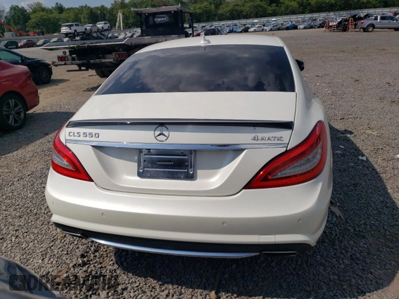 2014 Mercedes-Benz CLS-Class CLS 550 with VIN WDDLJ9BB9EA117290, listed as a Copart auction lot 68517414 with 98,705 mi miles and Salvage Title. Bid and sale history available at carsss.com. Image 6.