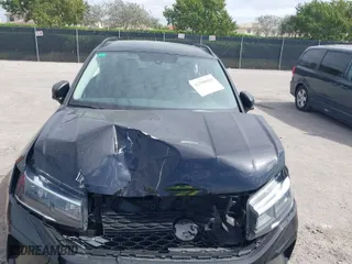 2023 Volkswagen Taos S with VIN 3VVCX7B27PM335958, listed as a IAAI auction lot 41598028 with 21,684 mi miles. Bid and sale history available at carsss.com. Image 6.