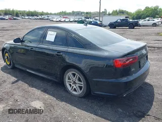 2016 Audi A6 Premium Plus with VIN WAUFGAFC7GN070599, listed as a IAAI auction lot 42460579 with 99,498 mi miles and . Bid and sale history available at DreamBid. Image 3.