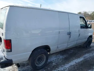 2006 Ford Econoline Cargo with VIN 1FTNE24WX6HB18195, listed as a IAAI auction lot 41365791 with 127,759 mi miles and . Bid and sale history available at DreamBid. Image 6.