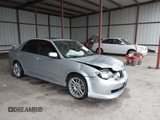 2003 Mazda Protege DX with VIN JM1BJ225030124381, listed as a IAAI auction lot 41607937 with 141,484 mi miles and . Bid and sale history available at DreamBid. Image 1.