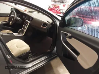 2017 Volvo S60 Dynamic with VIN YV140MTL0H2437537, listed as a IAAI auction lot 40801631 with 55,153 mi miles. Bid and sale history available at carsss.com. Image 5.