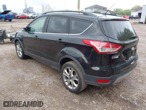 2014 Ford Escape SE with VIN 1FMCU9G9XEUD39077, listed as a IAAI auction lot 42205040 with 92,355 mi miles and . Bid and sale history available at DreamBid. Image 3.