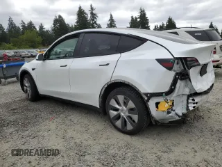 2023 Tesla Model Y Long Range z VIN 7SAYGDEE9PA081604, wystawiony jako Copart lot #60163785 z przebiegiem 42 134 mil mil oraz Szkoda całkowita • Salvage title. Historia ofert i sprzedaży dostępna na DreamBid. Obrazek 2.