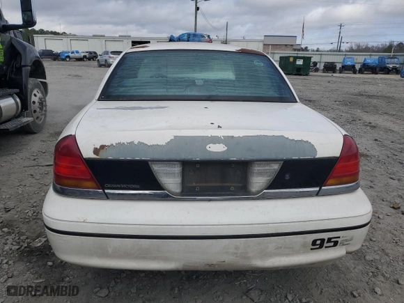 1999 Ford Crown Victoria Police Pkg with VIN 2FAFP71W6XX107511, listed as a Copart auction lot 44328975 with 188,433 mi miles and Salvage Title. Bid and sale history available at carsss.com. Image 6.