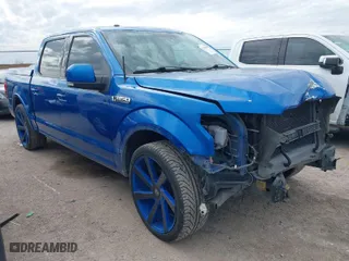 2015 Ford F-150 XL with VIN 1FTEW1CF7FKD47302, listed as a IAAI auction lot 41313284 with 125,985 mi miles. Bid and sale history available at carsss.com. Image 1.